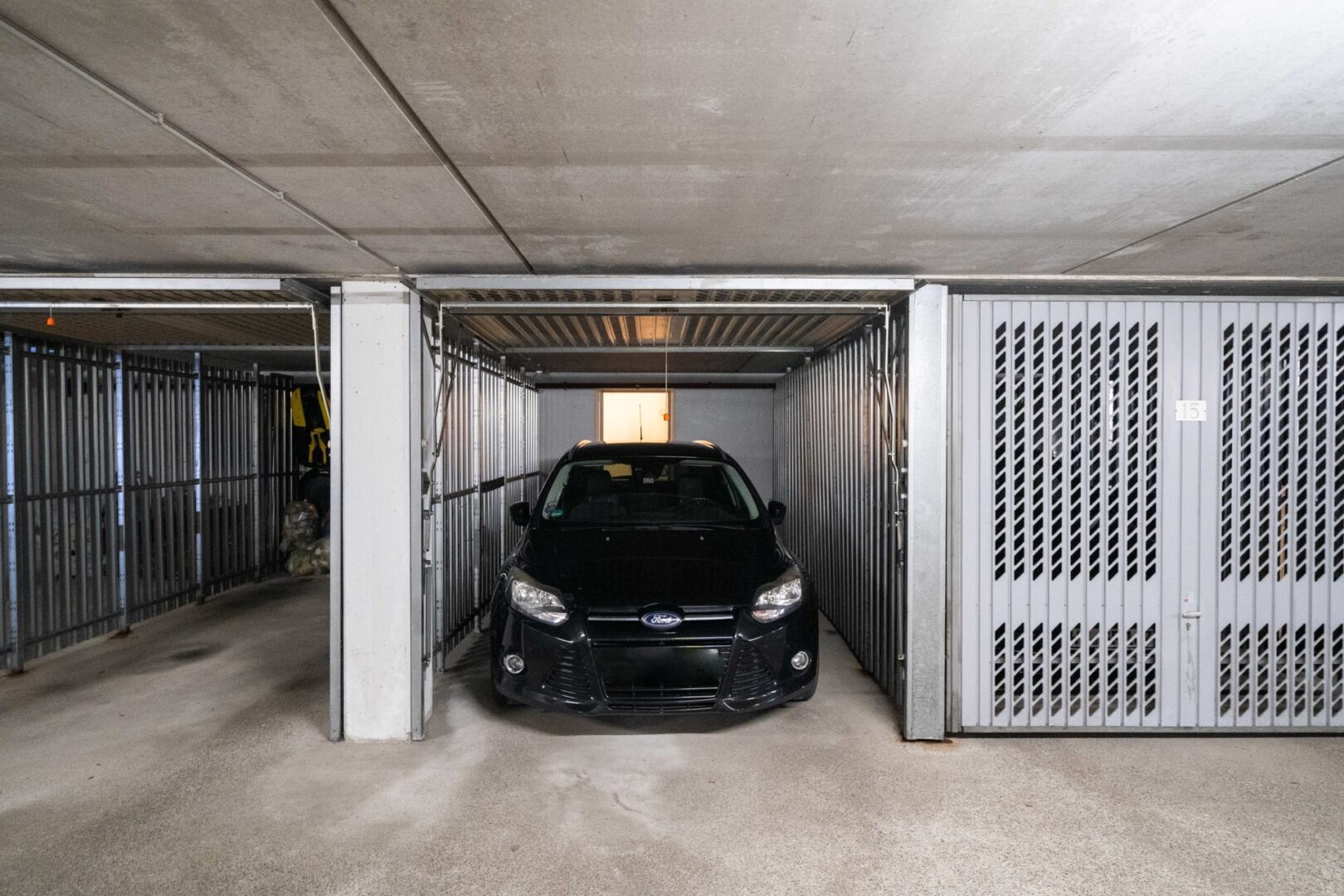 Tiefgaragenbox (Zugang über Keller)